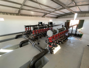 5 Interior of a pump house showcasing installed pipes, pumps, and fittings